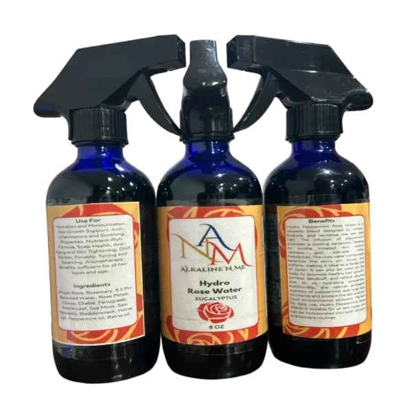 A group of three bottles with spray nozzles.